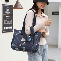 Sac à main pour femme de luxe décontracté de haute qualité personnalisé Grande capacité Imperméable à l'eau Sac à main à fermeture éclair tendance Nouveau design