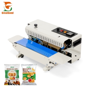 Machine de scellage à bande continue rapide et automatique à bas prix pour sachets de sucre, bonbons et snacks en PE/PVC, pour usage commercial et domestique - Product Image 1