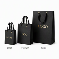 Sacs cadeaux personnalisés de luxe écologiques et durables avec logo en feuille d'or, poignée en ruban de soie, sacs en carton noir mat de qualité supérieure pour bijoux