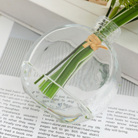 Vente en gros d'orchidées et de marguerites artificielles blanches de 28 cm dans un vase en verre avec de l'eau artificielle pour la décoration de la maison, du bureau ou d'une table de mariage