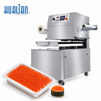 Machine d'emballage sous vide rotative automatique Hualian HVT-450R pour l'emballage sous film de caviar, œufs de poisson, œufs de saumon