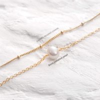 Bracelet minimaliste à perle unique de style européen et américain pour femme, en acier inoxydable double couche, vendu à l'international