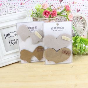 Pinces à cheveux style coréen en forme de nœud avec autocollants magiques pour fixer les franges, usage quotidien, couleur aléatoire, en résine plastique, fabriqué à Yiwu - Product Image 1