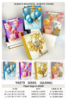 Sacs de courses en papier personnalisés avec poignées bleues et colorées pour anniversaires, design artisanal, 32x12x40 cm, en stock