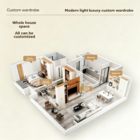 Meubles de rangement en verre sur mesure haut de gamme avec îlot central et tiroirs, créant une dressing intégrée pour la chambre de villa