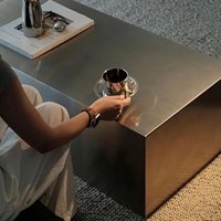 Vente directe d'usine, table basse en métal de style industriel Baughaus, façade nette, modélisation en blocs, ton froid, personnalisable