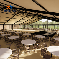 Tente Arcum avec panneaux de verre pour toit, structure moderne et transparente pour expositions et événements en plein air, imperméable, durable, crée une ambiance accueillante