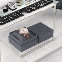 Boîte cadeau pour montre simple en papier rigide écologique noir avec logo personnalisé, impression en relief et laminage mat