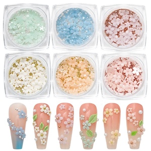 6 unids/bolsa colorida Flor de cinco pétalos que cambia de Color <span class=keywords><strong>con</strong></span> pequeña bola de acero 3D resina flor blanca mezcla decoración de <span class=keywords><strong>uñas</strong></span> - Product Image 2
