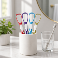 Grattoir à langue en plastique antibactérien en gros avec poignée manuelle antidérapante, portable pour usage domestique