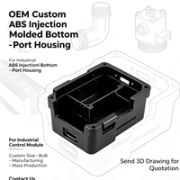Boîtier moulé par injection en ABS noir personnalisé avec port inférieur et languettes de fixation pour module de contrôle industriel
