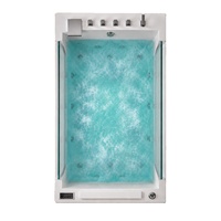 Baignoire hydromassante en acrylique extra large de 1700 mm avec panneaux transparents et système de massage sous-marin pour un bain à bulles confortable