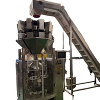 Machine de pesage, d'emballage, de remplissage et de scellage automatique multi-têtes de haute précision pour aliments surgelés, noix, plastique et papier