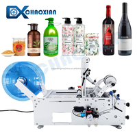 Machine d'étiquetage avec ruban adhésif pour bouteilles rondes, contenants de cuisine, machine d'étiquetage de bureau