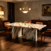 Table à manger portable 6 places en marbre onyx coloré, design moderne et vibrant, avec plateau rond et pieds inclinés, pour la maison et les halls d'hôtels de luxe