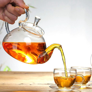 Tetera de vidrio de borosilicato con infusor, tetera de vidrio transparente con flores florecientes, a prueba de fuego - Product Image 1