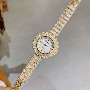 Reloj de pulsera minimalista redondo con diamantes para mujer, pulsera informal de moda, reloj de cuarzo elegante con diamantes completos - Product Image 1