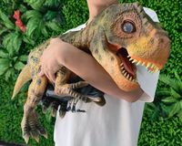 Marionnette de main en silicone T-Rex animatronique pour parcs d'aventure, centres commerciaux et garderies