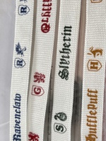 Fabricantes de Bandas Elásticas de nailon con logotipo personalizado al por mayor cinturón elástico en relieve negro correas elásticas de poliéster para sombreros de peluca