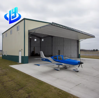 Hangar Professionale in Acciaio Zincato con Rivestimento Anticorrosione, Struttura a Campata Libera, Alta Resistenza al Vento, Durevole