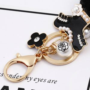 New Fashion Black Skirt Keychain Pearl <b>Key</b> Chains Women Bag Charm Pendant Car <b>Key</b> <b>Ring</b> Creative Dress Design Keyings Wholesale - Product Image 2