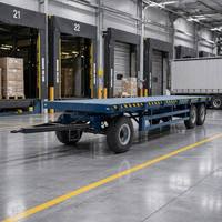 Remorque à plateau plat industrielle avec barre de traction pour la manutention de matériaux en entrepôt