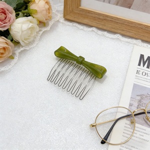 Peigne à cheveux élégant avec nœud, mini brosse décorative en alliage et acétate pour usage quotidien avec fonction de massage capillaire - Product Image 4