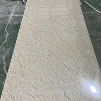 Prix de gros Feuille de marbre UV en PVC à haute brillance Panneau mural en plastique à motif de marbre artificiel au design moderne