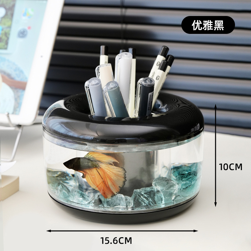 Élégant aquarium noir en forme d'anneau.