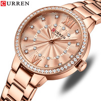 Montre pour femme en or rose, lunette en cristal, chiffres romains, cadran guilloché, bracelet à trois maillons, élégante