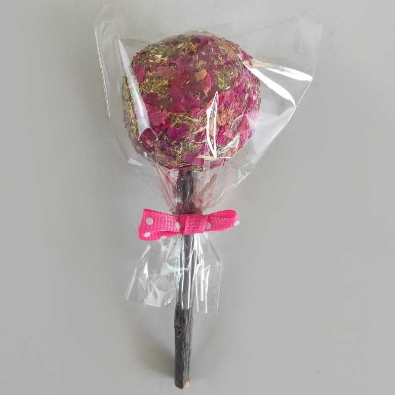 Sucette rose avec emballage