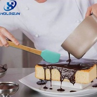 Accessoires de cuisine Outil de cuisson Petit grattoir à crème en silicone Spatule à beurre avec manche en bois Couleur personnalisée disponible