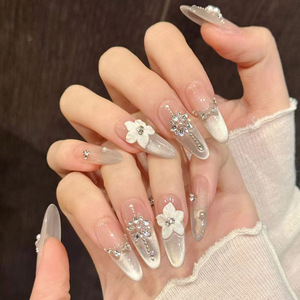 Uñas postizas semimanuales tejidas a máquina, estilo francés y europeo, con diseño de lazo de perlas de <span class=keywords><strong>gardenia</strong></span> tridimensional y efecto ojo de gato, venta al por mayor a bajo precio. - Product Image 3