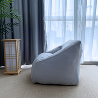 Fauteuil douillet en polaire berbère avec poignée, base antidérapante, rembourrage en mousse déchiquetée et housse extensible – Vente en gros