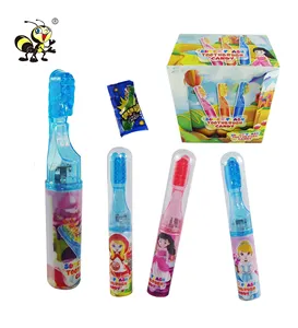 Enfants en plastique brillant jouet dent brosse à dents jouets avec des bonbons bonbons durs en gros avec des bonbons magiques à éclater