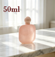 Flacon de parfum en verre rose de luxe de 50 ml, nouveau design féerique, avec bouchon rond, fabrication en usine, étiquette privée personnalisée, vente en gros en vrac