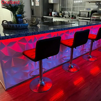 Discothèques espace de vente au détail noir surface solide dessus en pierre comptoir de bar à cocktails haut de gamme personnalisé avec éclairage LED