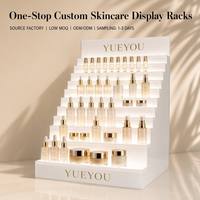 Support d'affichage cosmétique moderne en acrylique portable personnalisé avec lumières LED, design détachable pour boutique de détail, produits de beauté et maquillage de luxe