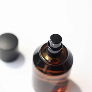 50ml Stock Amber Color Luxury <b>Empty</b> Cylinder Perfume <b>Spray</b> Glass <b>Bottle</b> With Black Cap - Product Image 1