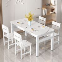 Combinaison table et chaises de salle à manger moderne et minimaliste avec motif marbré pour 4 à 6 personnes au restaurant