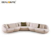 Canapé modulaire incurvé minimaliste italien inclinable I-side en tissu bouclé avec garniture en cuir pour salon et villa