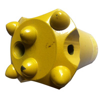 Accessoires de forage de roche offrant une réduction des vibrations et une formation de trous propres dans des conditions de forage difficiles