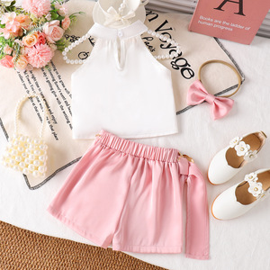 Set Estivo per <span class=keywords><strong>Bambina</strong></span> 2026, Top Corto Bianco con Fiori e Halter + <span class=keywords><strong>Pantaloncini</strong></span> <span class=keywords><strong>Verdi</strong></span> con Catena, Set di Moda 2 Pezzi - Product Image 5