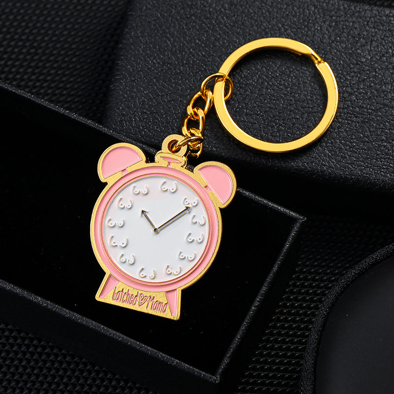 Modèle d'horloge porte-clés en métal