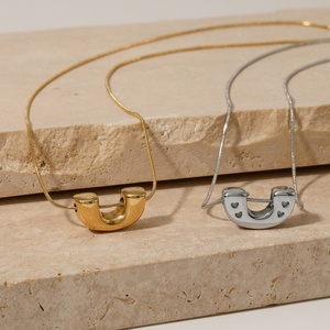 Conjunto de Joyería de Moda para Mujer: Pendientes de Acero Inoxidable con Cadena de Hueso de Serpiente y Collar Retro en Forma de U, Ideal para Aniversarios y Tendencias - Product Image 1