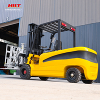 Dispositifs de poussée-tirage pour chariots élévateurs électriques et accessoires de calage de cartons pour les opérations d'entreposage et de logistique