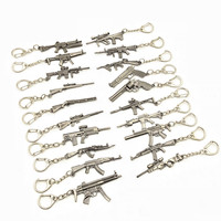 Porte-clés en métal miniature en forme de pistolet, modèle de couteau, vente en gros du fabricant, porte-clés personnalisé en métal en forme de pistolet