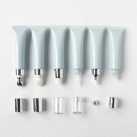 Tube ABL personnalisé de 15 ml avec applicateur en alliage de zinc, tête de massage en métal rafraîchissante pour l'emballage de gloss à lèvres