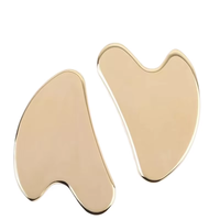 Outil de thérapie des tissus mous de masseur facial Gua Sha en cuivre avec panneau Guasha en métal et sac pour les produits de massage d'application du visage