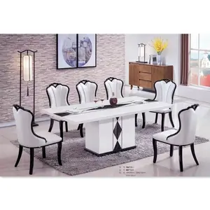 Designs de luxe italiens européens plus table à manger en pierre de marbre blanc et ensemble de 8 chaises en cuir